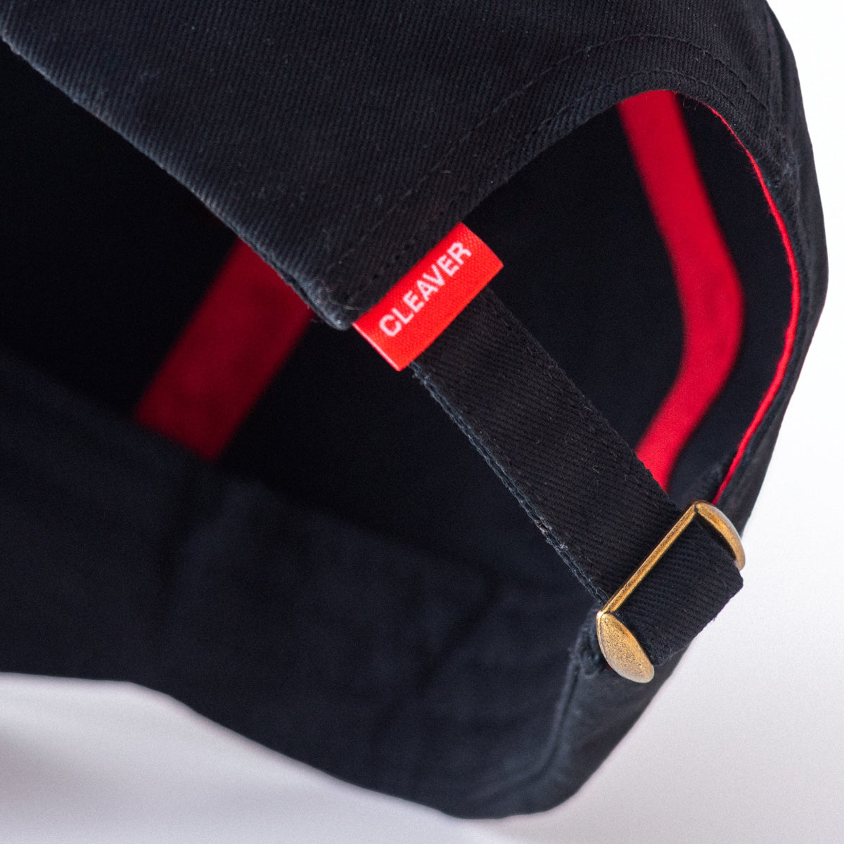 A tribute to The Sopranos, the “Movie” hat is inspired by Christopher Moltisanti’s metafictional horror film Cleaver. This six-panel unstructured low-profile hat is crafted from durable cotton twill and features a front embroidered logo, adding a touch of style. The self-fabric strap with a metal closure guarantees a comfortable, adjustable fit for all-day wear.